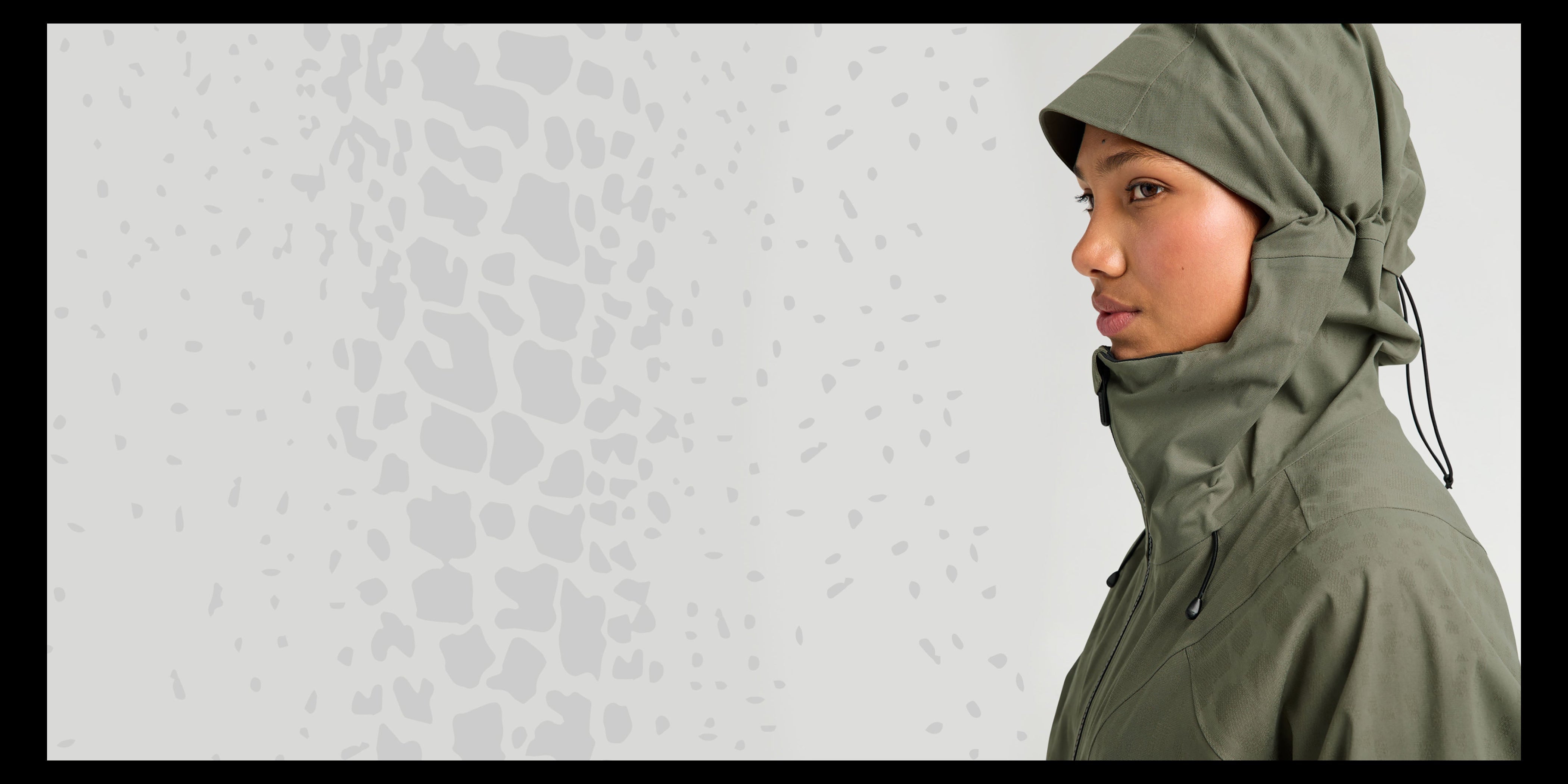 person modelling jacket hood feature