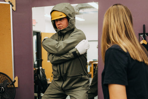 model tries on 2D Warp Knit outerwear