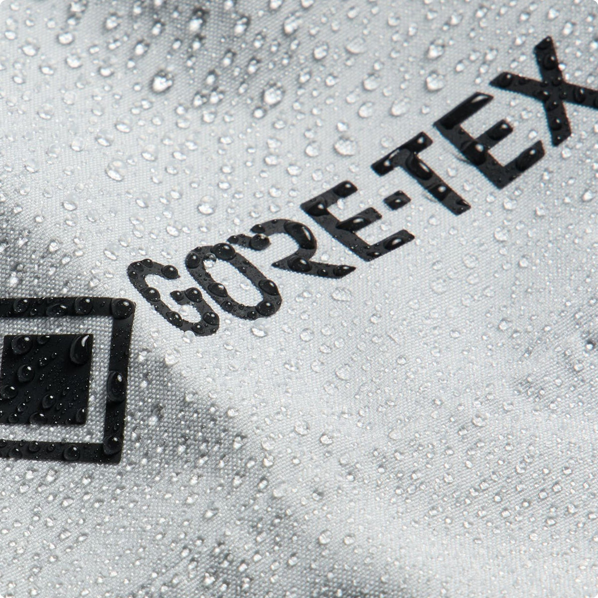 beads of water on gore-tex outerwear demonstrating waterproof function