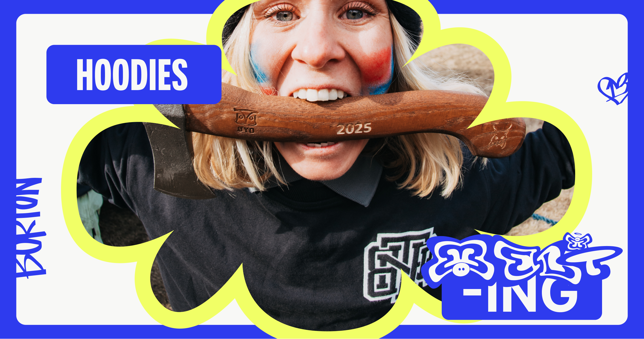 Ylfa wearing a Burton hoodie and holding an axe in her teeth. This is a promotional banner for new Burton hoodies.