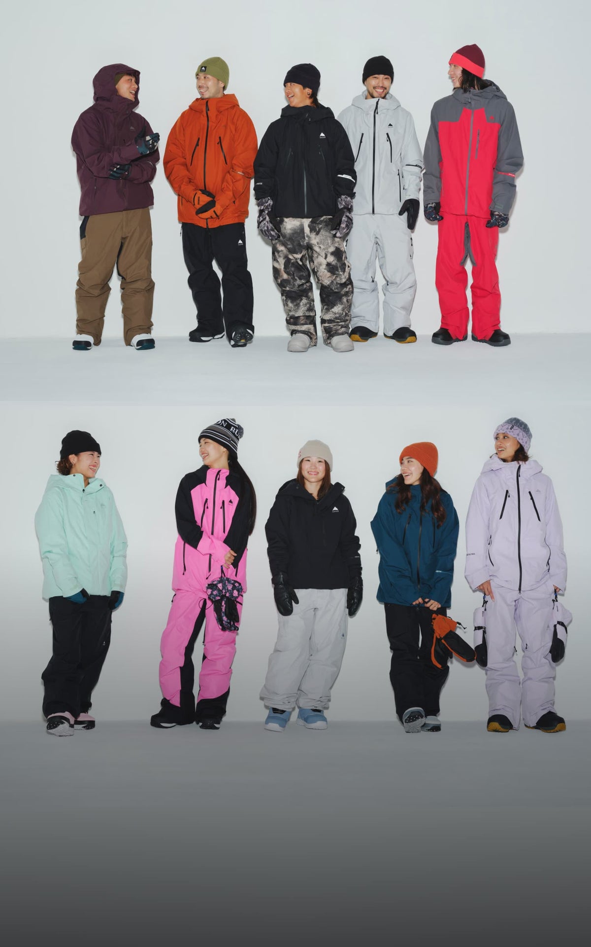 Ten models wearing colorful snowboard outfits are arranged in two rows against a plain white studio background.