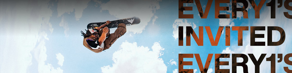 A snowboarder in mid-air performing a trick against a bright blue sky with clouds, next to large promotional text reading 'EVERY1'S INVITED'.