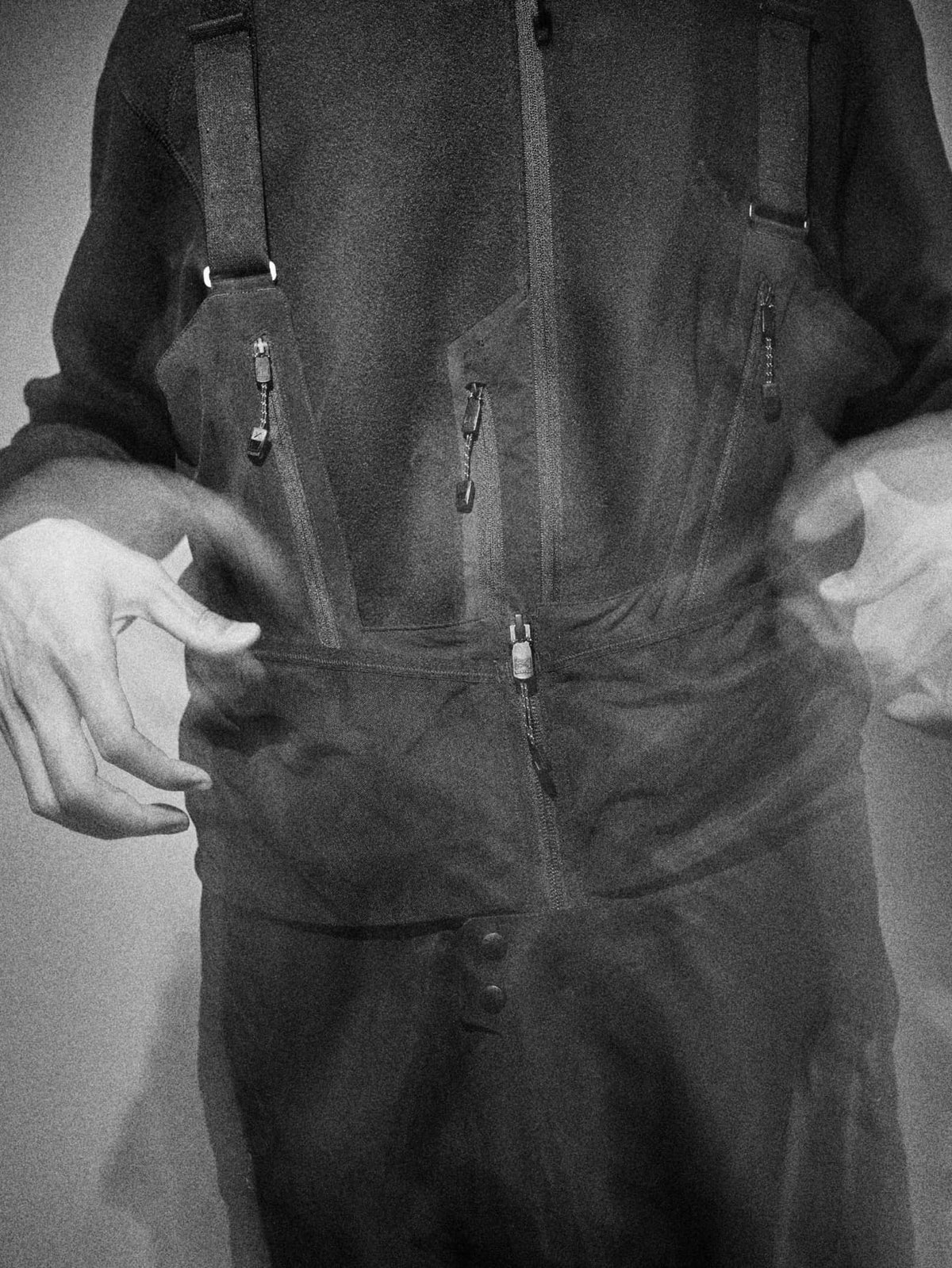 A person wearing bib pants